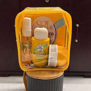 Sol de Janeiro Beauty Essentials in Bright Yellow Bag